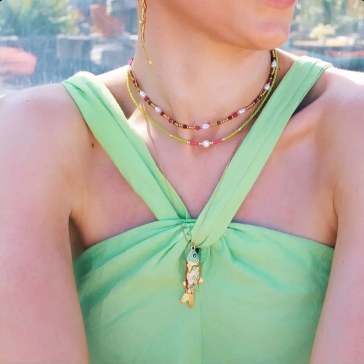 fine-braided-necklace-with-colored-fish-charm-2